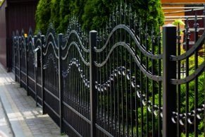 Newly installed metal fencing with sliding gates on a huge residential property in Wollongong NSW.