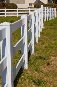 White coloured PVC fence installed in a farm in Wollongong NSW to protect the property.